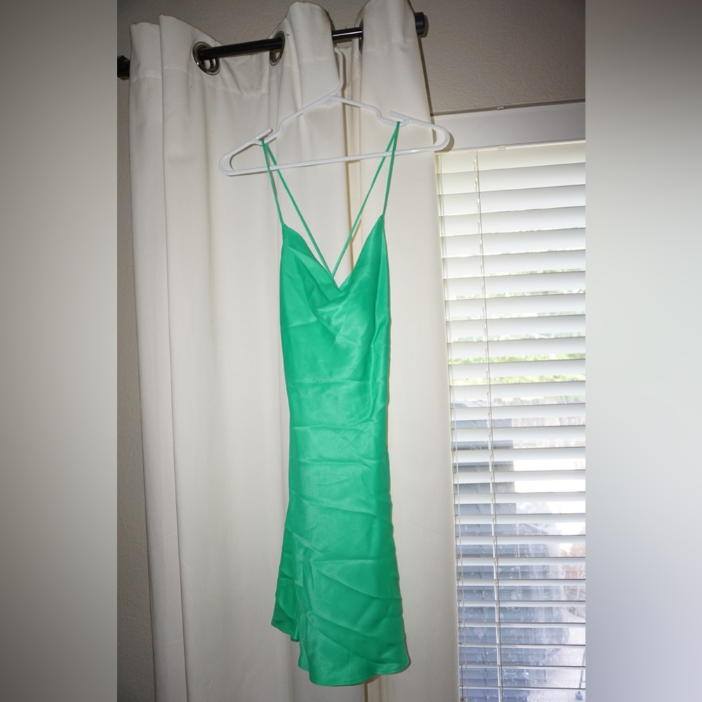 Bright green slip dress with criss-cross back